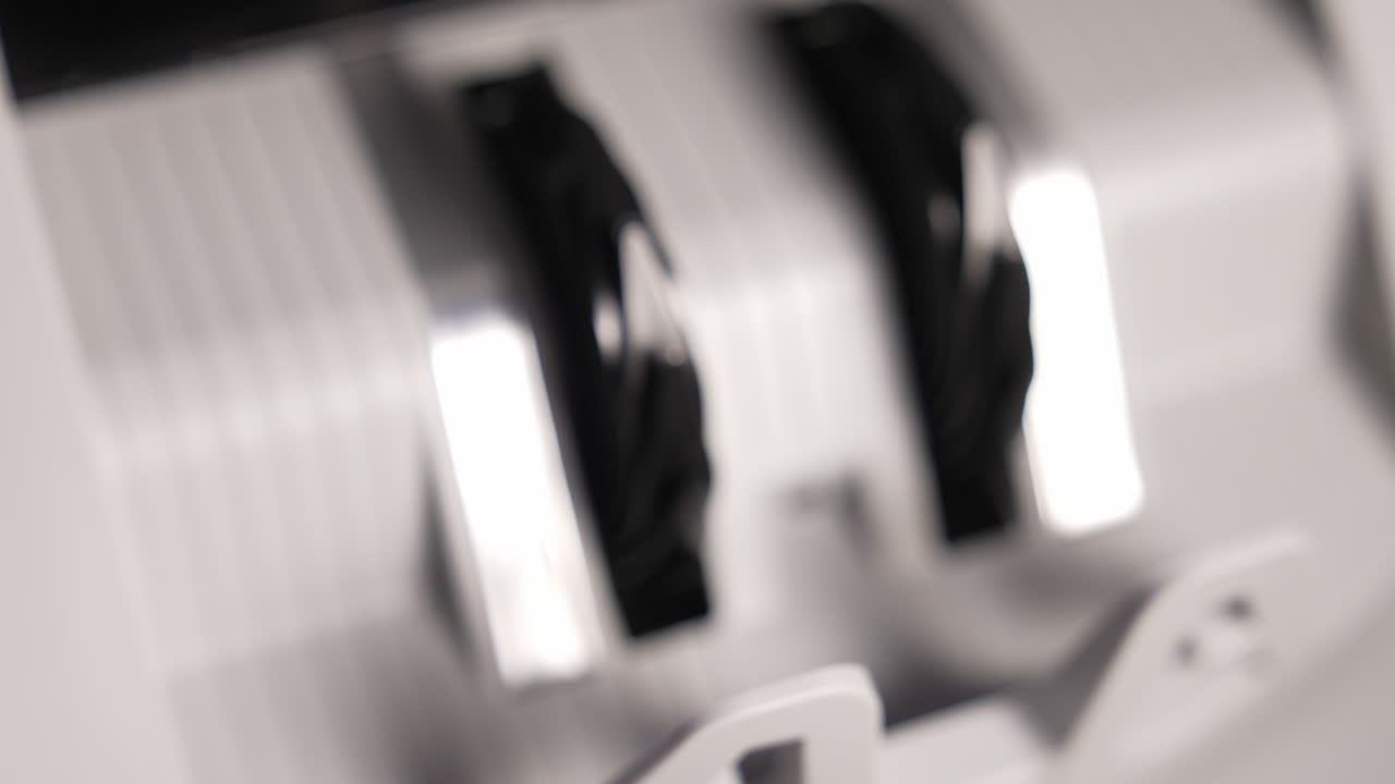 Money counter machine counting New 100 US dollar.