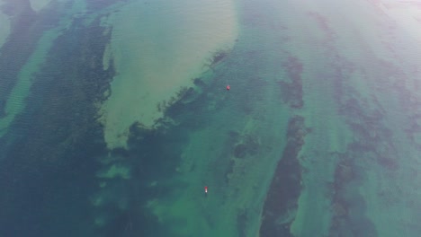 Aerial-view-of-buoys-on-the-Barwon-River-near-Barwon-Heads,-Victoria-Australia