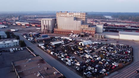 aerial drone shot of the wrecked car yards in the industrial area of calgary, alberta