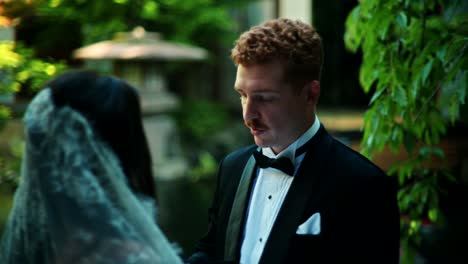 couple in formal wear at a japanese garden
