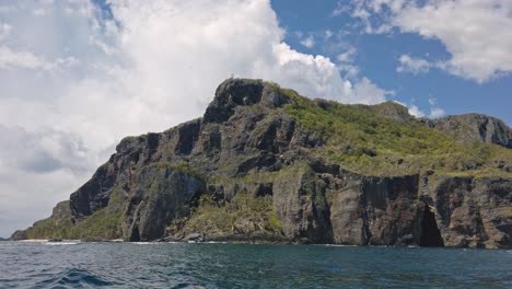 boat process plate of las galeras headland and cliffs in dominican republic