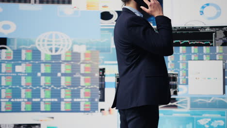 expert businessman on a smartphone call discussing finance and analytics
