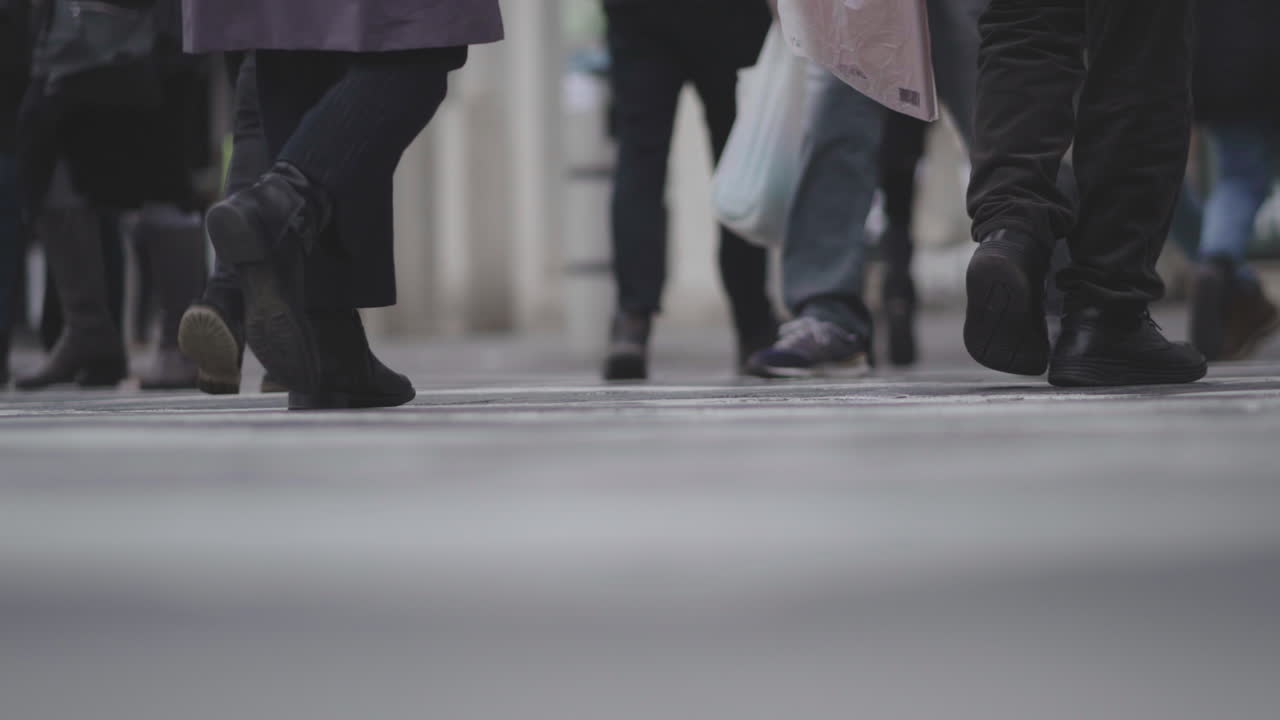 People Walking on a Crosswalk