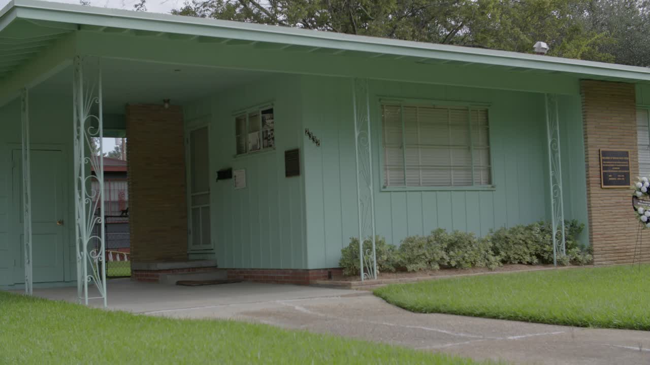 Civil rights leader Medgar Evers home. Site of his assassination. Medium, pan to carport. Jackson, Mississippi.