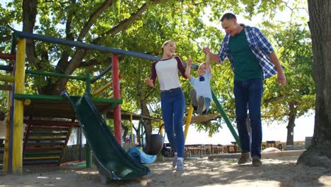 family walking in the playground 4k