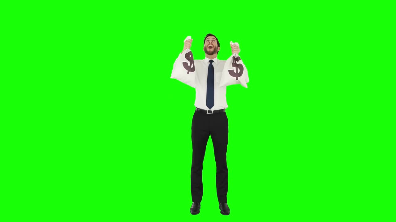 Empresário feliz mostrando sacos de dinheiro