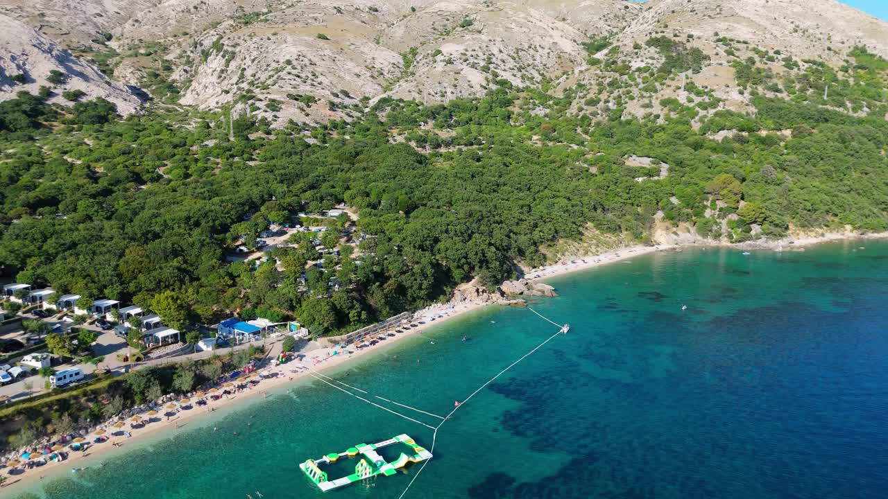 Campsite at Campig Skrila, Krk Island, Stara Baska Croatia, Aerial View of the Mountains and Coast With Boats, Beaches and Adriatic Sea. The Seaside Rv Campmobiles on a Summer Beautiful Coastline
