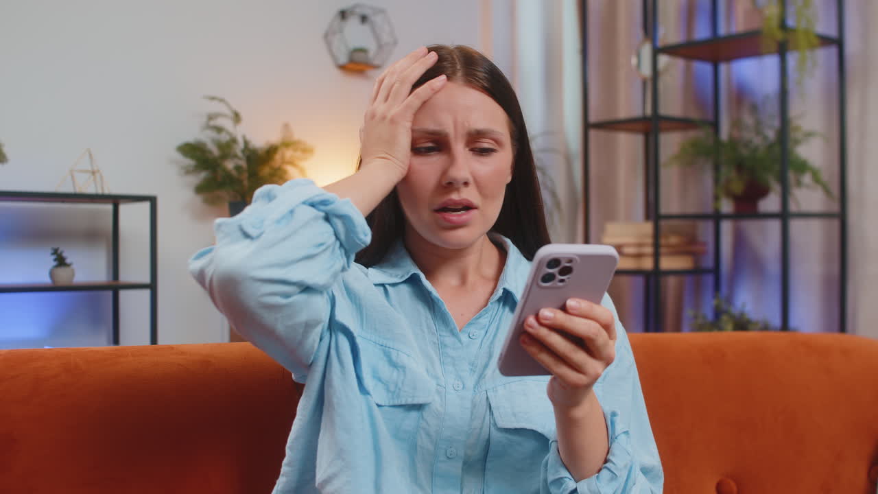 Sad displeased caucasian woman using smartphone receive bad news fortune loss fail deadline virus