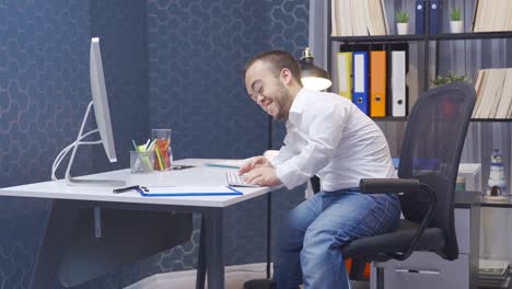the dwarf man who loves his job. he works in his office.
