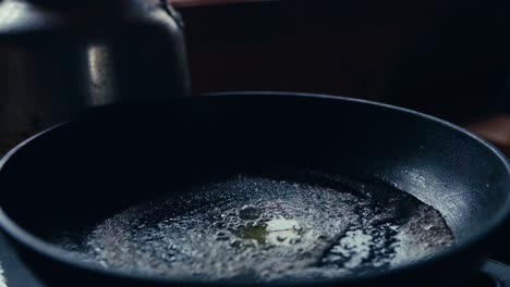 cooking in a rustic pan. close-up