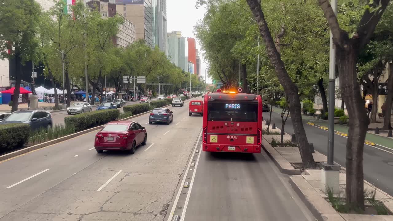 Mexico City Street Scene with Red Bus