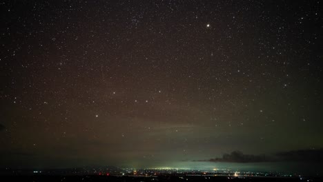 city lights under a starry night