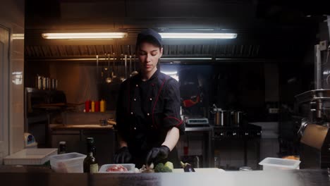 professional chefs preparing food in a restaurant kitchen