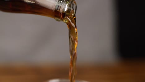serving-coke-soda-from-glass-bottle-close-up-slow-motion-120p