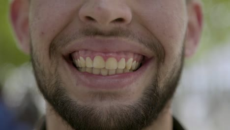 cropped shot of smiling male face.