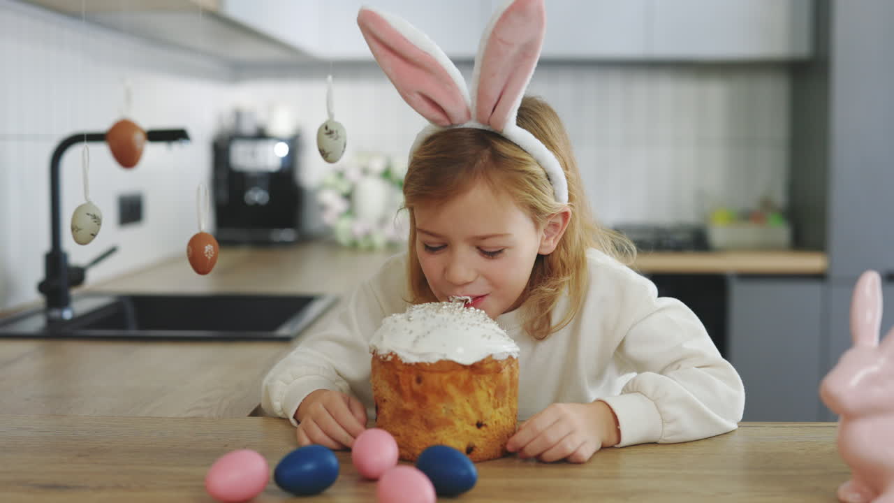 Girl Eating Easter Cake with Bunny Ears