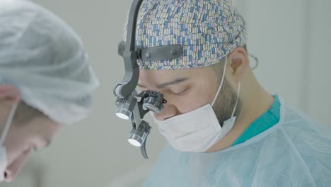 surgeon performing a procedure