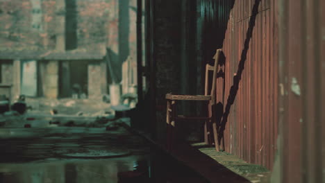 abandoned chair in a ruined building