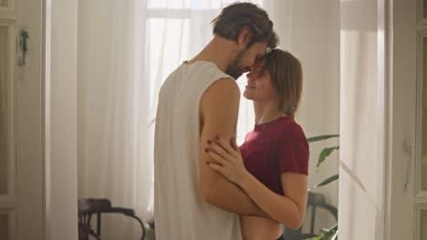 couple interacting in a home