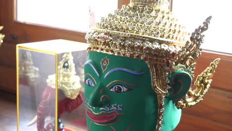 beautiful painted yaksha head, close up