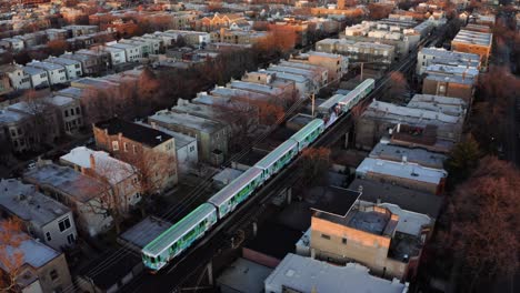 Birds-Eye-Aerial-View-of-Festive-Holiday-Train-in-Chicago,-Illinois