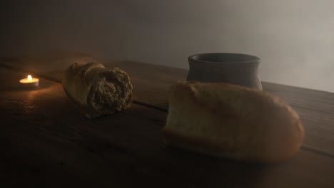 bread and cup on wooden table