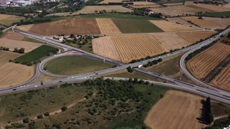 aerial view of highway intersection and farmland