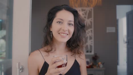 woman drinking in a home