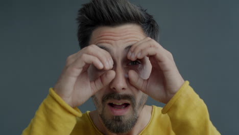 man expressing joy and surprise