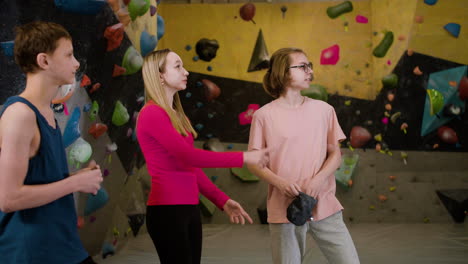 friends in a climbing gym