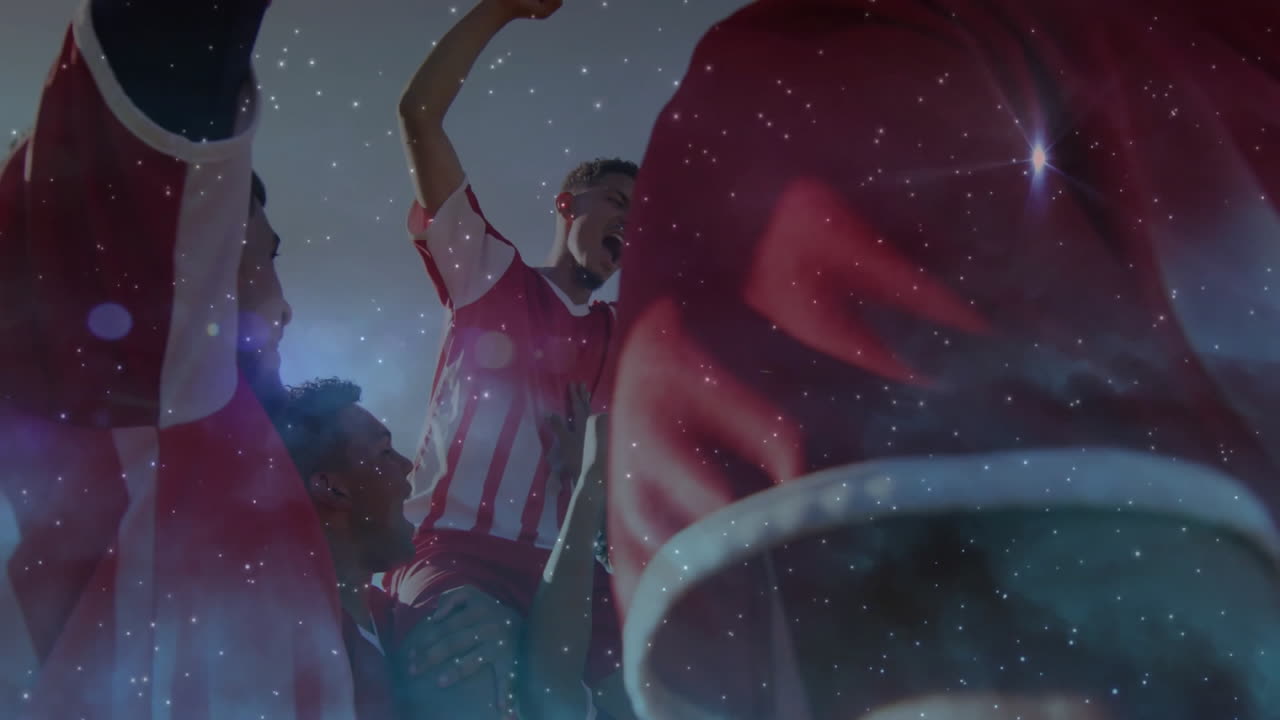 Male fans raising arms, cheering under lens flares and sparkles, using sports marketing technology