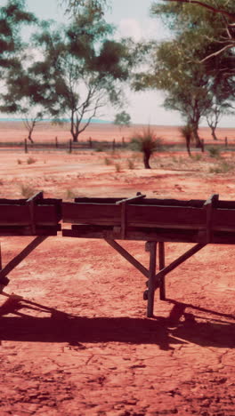 red dirt and wooden structure in the australian outback