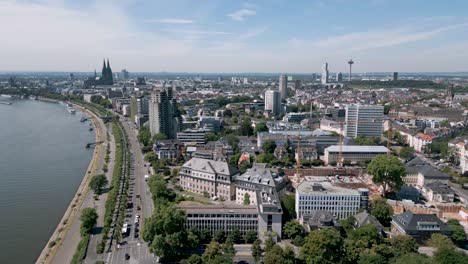 Cologne,-Germany---A-Drone-aerial-bird-view-of-the-panorama-of-Köln---Seen-from-the-north-with-the-Dom,-tv-tower,-high-rise-buildings-and-residential-area-along-the-river-Rhein