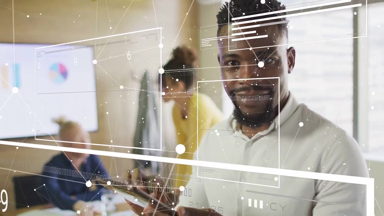 Team lead tapping tablet, causing HUD overlays to align with tablet while reviewing business data