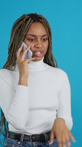 young woman expressing various emotions during a phone call