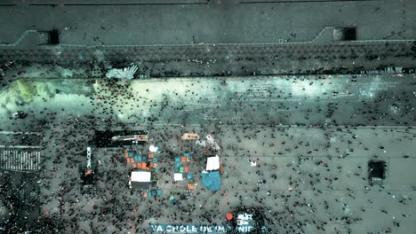 cenital view with drone of womens day march in mexico city main plaza zocalo