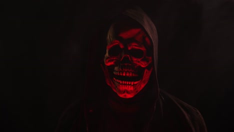 Scary-Skeleton-skull-head-figure-in-a-hood-for-Halloween-or-horror-videos