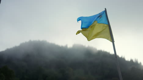 national flag of ukraine developing on flagstaff. patriotism concept.