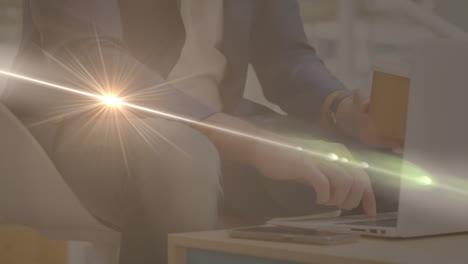 animation of light trails over caucasian businessman