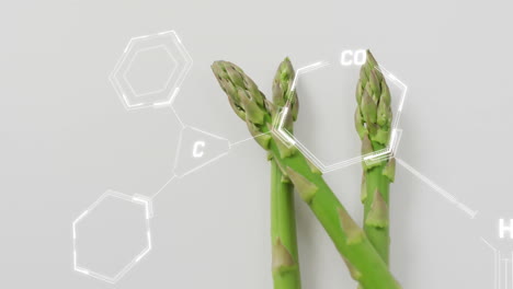 animation of chemical formula over asparagus