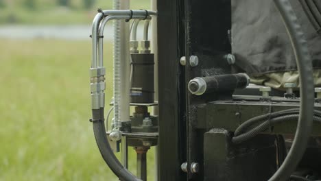 soil sampling. a vehicle with special equipment collects soil samples for analysis. soil sampling high rainfall pastures. soil examination