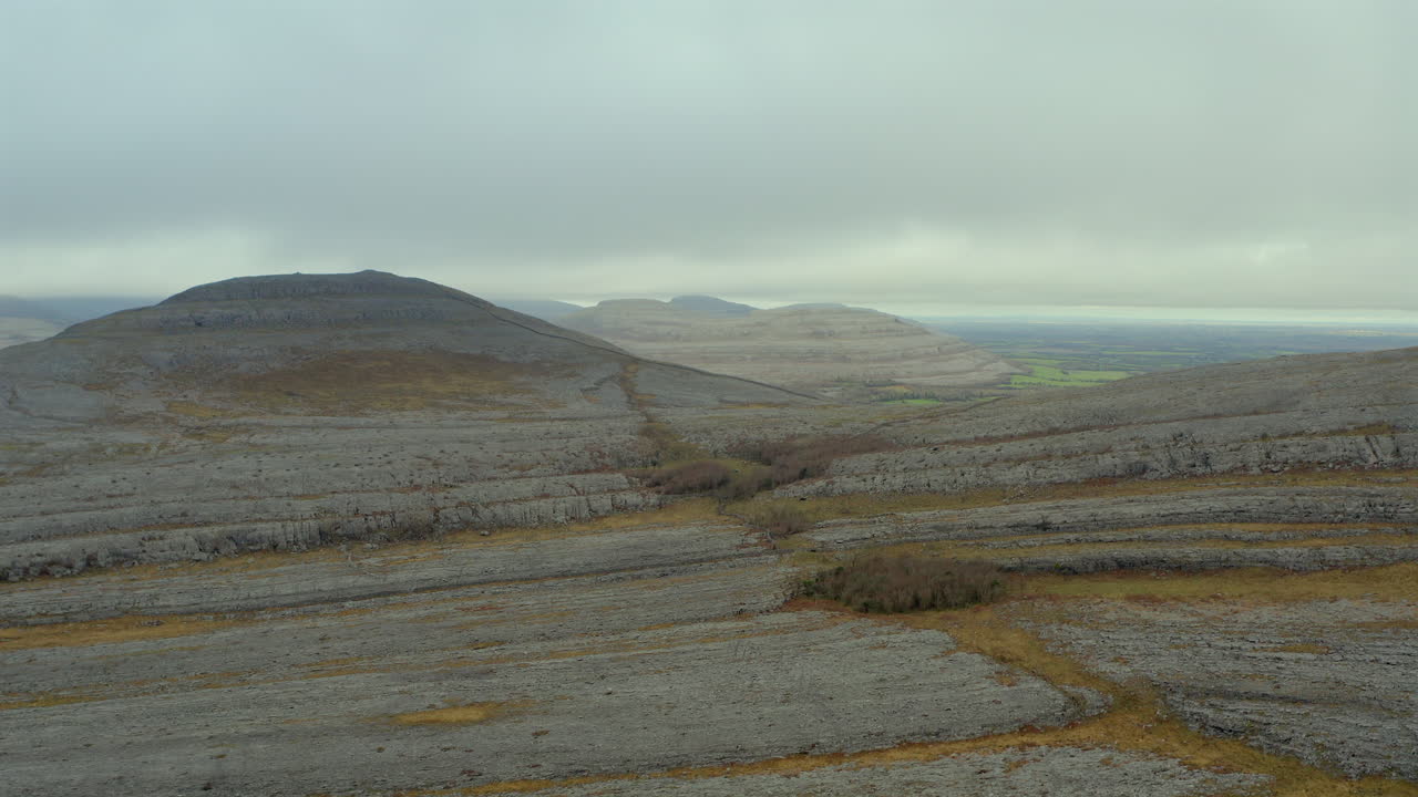 Aerial establishing shot of Burren's Rocky Mountains. County Clare. Ireland