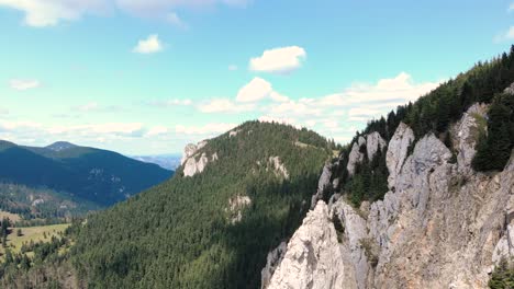 Rugged-Rock-Formation-Of-Hasmas-Mountains-Covered-In-Dense-Foliage