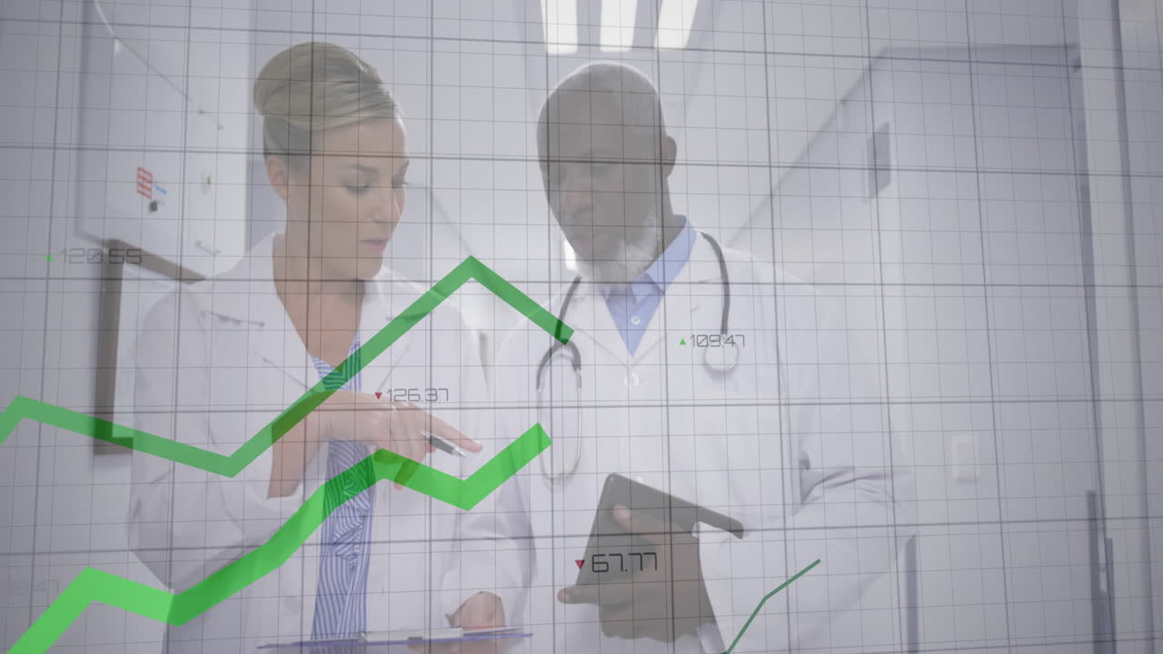 Two doctors standing side by side in modern hospital corridor, overlaying green medical line graphs