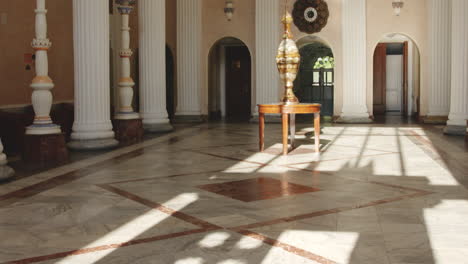 ornate tile floor in classicist hall with high ceiling, tskaltubo spa