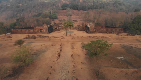 Wide-view-of-Vat-phou-temple-complex-at-Laos-during-sunrise,-aerial