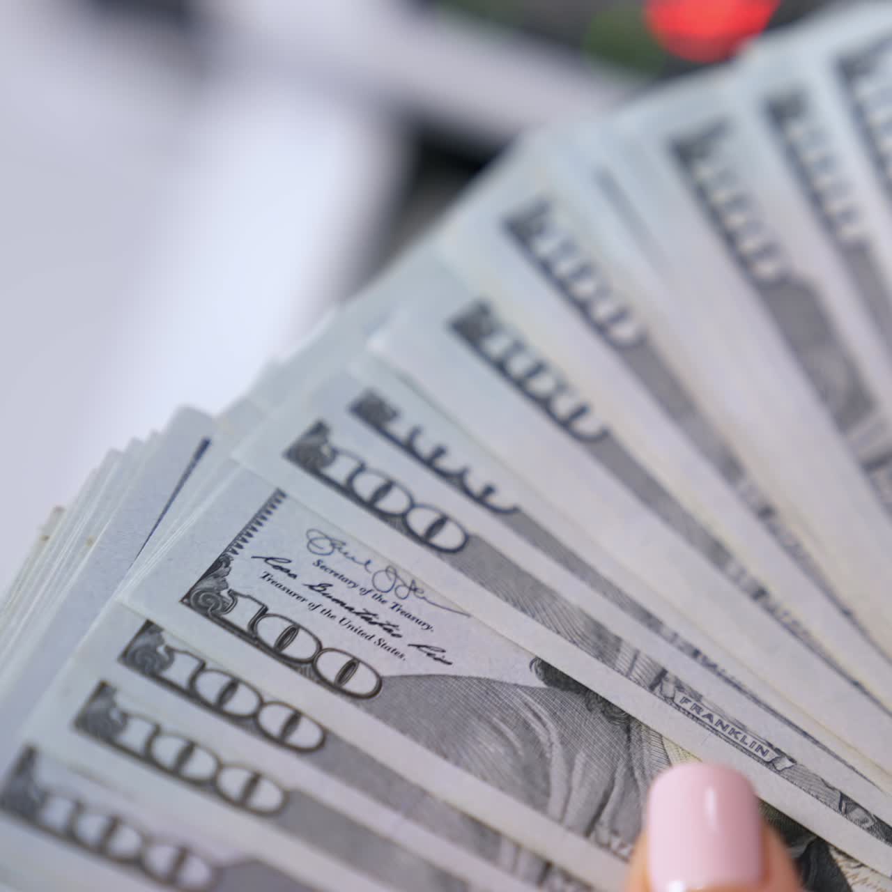 Female hands counting us dollars. Woman hand count the united states currency. A bunch of american Banknotes