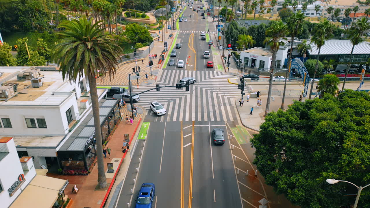 Los Angeles, USA, 29 August 2025: Approaching the crossroads with numerous cars. Footage above the cityscape of Los Angeles, California, USA