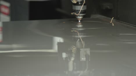 Laser-cutter-cutting-metal-plates