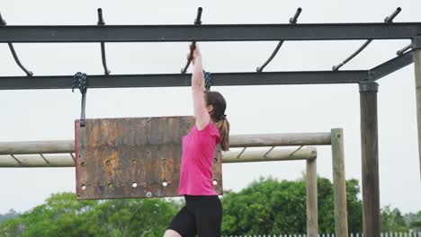 caucasian woman exercising at bootcamp